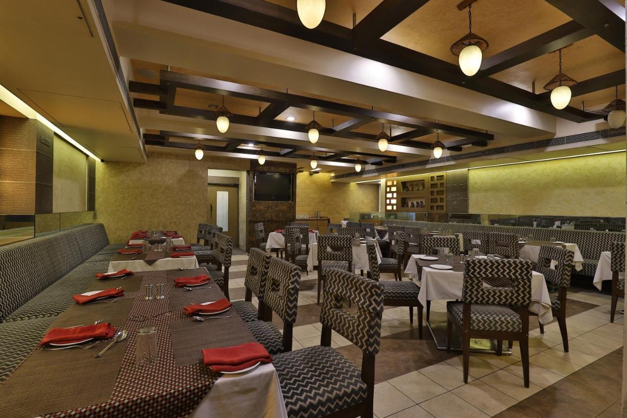 Capital O 1338 Hotel Harmony Rajkot Eksteriør bilde